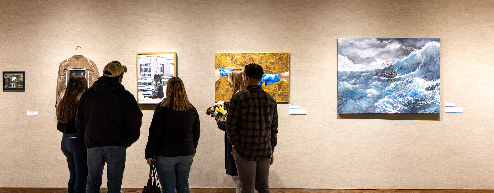 Students viewing Student Art Exhibition in Schlueter Art Gallery